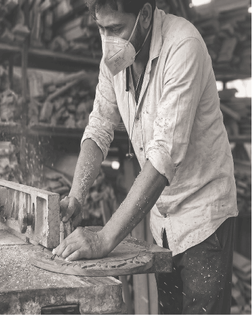 Artisan shaping wood